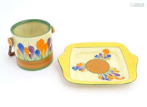 A Clarice Cliff sandwich plate decorated in the Crocus patte...
