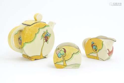 A Clarice Cliff tea set decorated in the Moonlight pattern c...