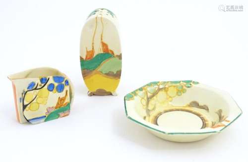 Three items of Clarice Cliff pottery decorated in the Secret...