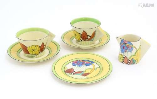 A quantity of Clarice Cliff pottery wares decorated in the M...