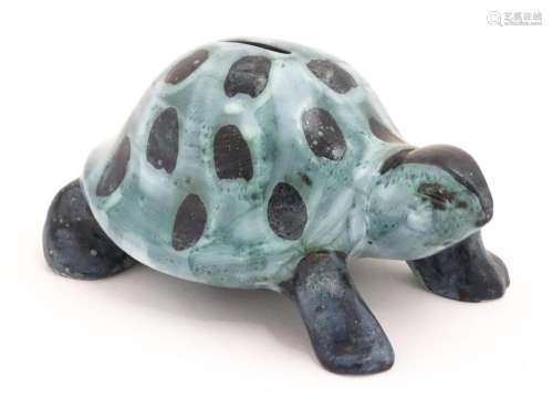 A studio pottery money box modelled as a tortoise by David S...