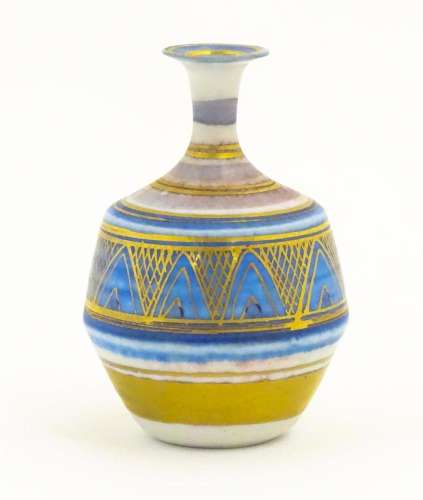 A small studio pottery vase by Mary Rich with banded and geo...