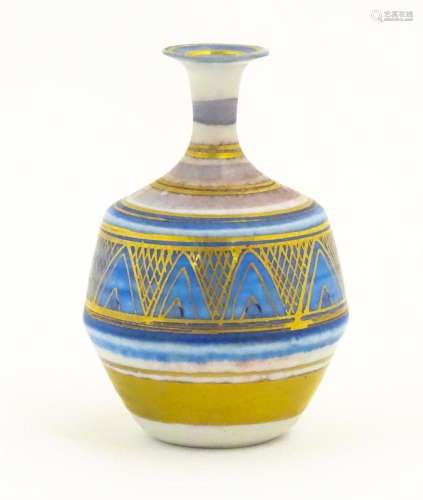 A small studio pottery vase by Mary Rich with banded and geo...