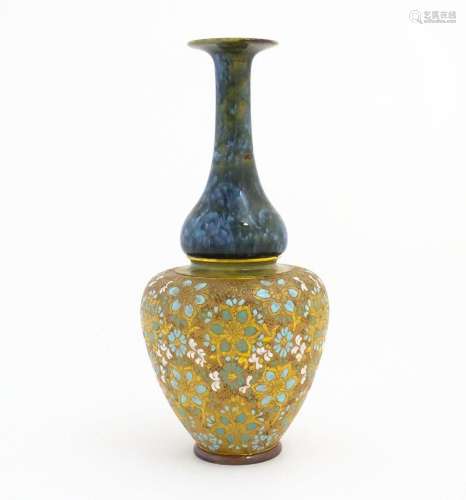 A Doulton Lambeth ovoid vase with mottled blue glaze to neck...