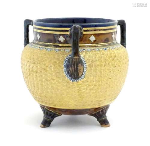 A Royal Doulton stoneware gilt circle tyg of cauldron form w...