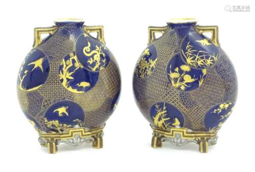 Two Royal Worcester Aesthetic Movement moon flask vases with...
