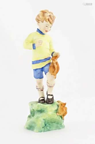 A Royal Worcester figure depicting a boy with two squirrels,...