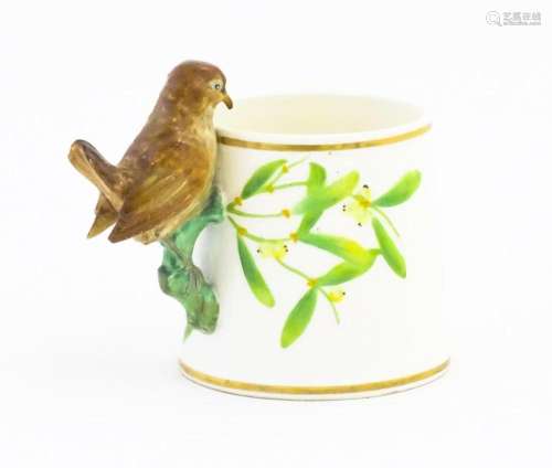 A Victorian Copeland mug, the handle modelled as a wren / bi...