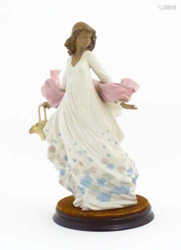 A Lladro figure titled Spring Splendor, model no. 2325. With...
