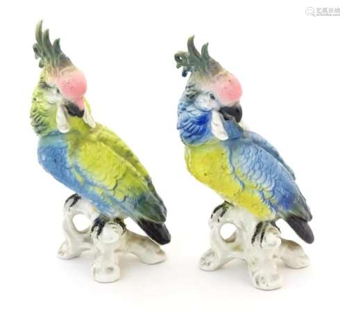 Two Karl Ens models of parrots / cockatiels in blue and yell...
