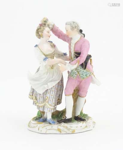 A Meissen figure group modelled as a dancing couple. Marked ...