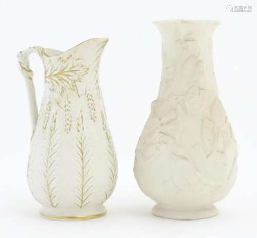 A Victorian jug by William Brownfield decorated with sheafs ...