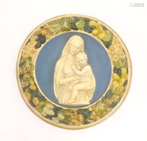 A Della Robbia style plaque depicting Mother & Child in ...