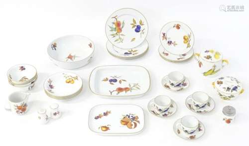 A quantity of Royal Worcester dinner wares in the Evesham pa...