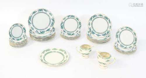 A quantity of dinner wares in the Dragon pattern, to include...
