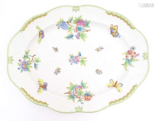 A Herend porcelain meat plate decorated in the pattern Queen...