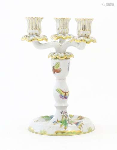 A Herend porcelain two sectional three branch candlestick / ...