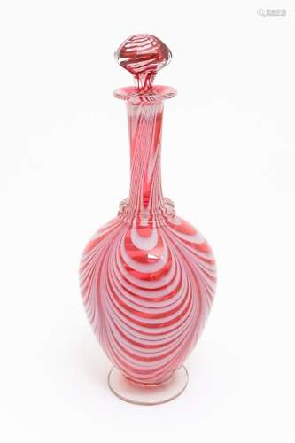 A Victorian cranberry and white glass Nailsea style decanter...