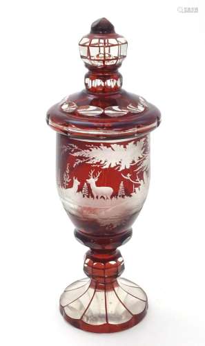 A Victorian Bohemian ruby red and clear glass vase and cover...