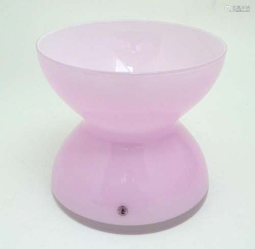 A pink hour glass vase designed by Anne Nilsson. Approx. 9&q...