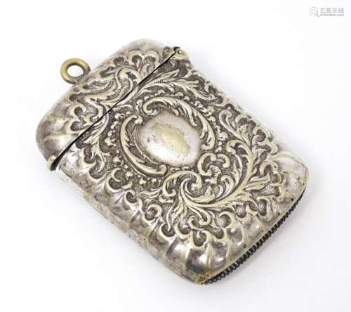 A silver plate vesta case with embossed decoration. Approx. ...