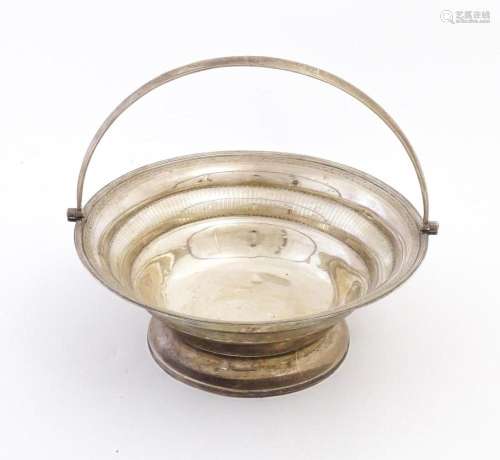 A Geo III large silver bowl pf circular form with engraved d...