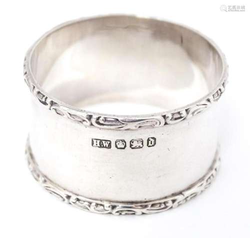 A Victorian silver napkin ring, hallmarked Sheffield 1896 ma...