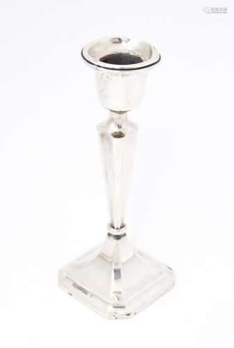 A silver candlestick hallmarked Birmingham 1915 maker Henry ...