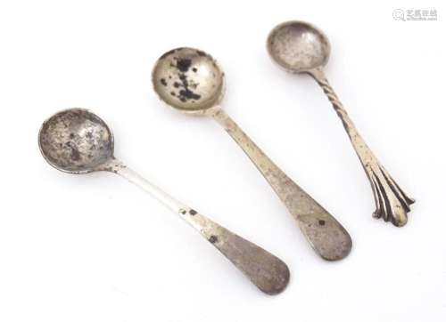 Three various silver salt spoons to include an Albany patter...