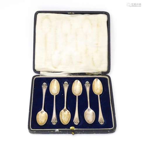 A cased set of six silver teaspoons hallmarked London 1921 J...