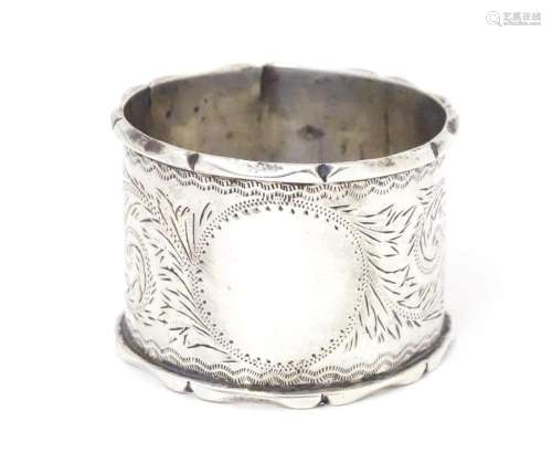 A silver napkin ring hallmarked Birmingham 1900 maker Willia...