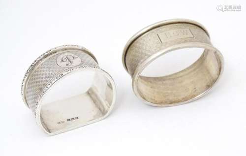 Two napkin rings with engine turned decoration . One of D-sh...