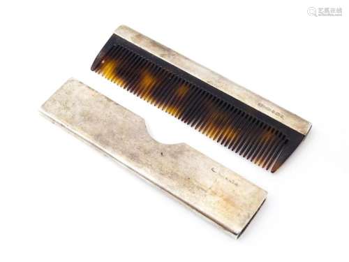 A silver cased and mounted hair comb. Hallmarked Birmingham ...