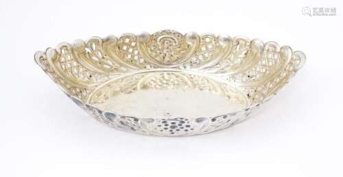 A Victorian silver sweet meat dish of oval form with pierced...