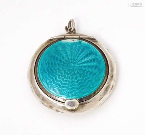 An Art Deco silver small compact / pill box with turquoise g...