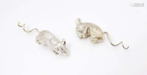 Two silver models of mice , possibly for use on a cork or a ...