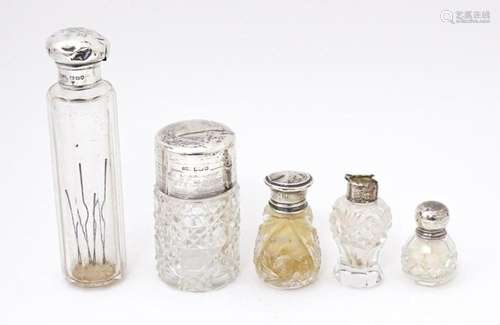 Five assorted glass dressing table jars / scent / perfume bo...