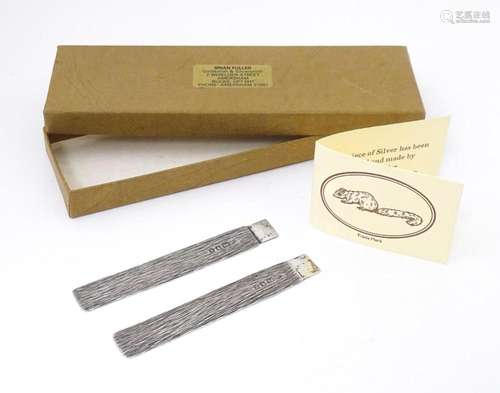 Two Elizabeth II silver bookmarks with textured finish, hall...