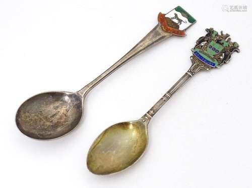 Two silver souvenir teaspoons with enamel decoration to hand...