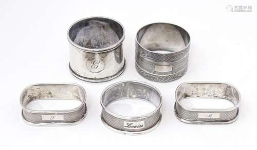 Five assorted silver napkin rings to include two hallmarked ...