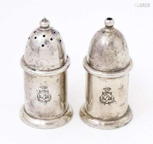 A pair of silver plate pepperettes stamped under Mappin &...