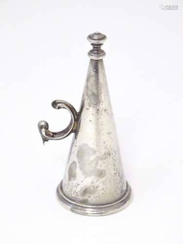 A 19thC silver candle snuffer of conical form. Hallmarked Lo...