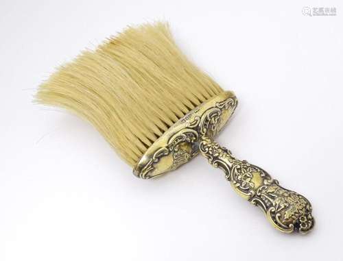 A silver gilt handled hat brush hallmarked Birmingham 1899 m...