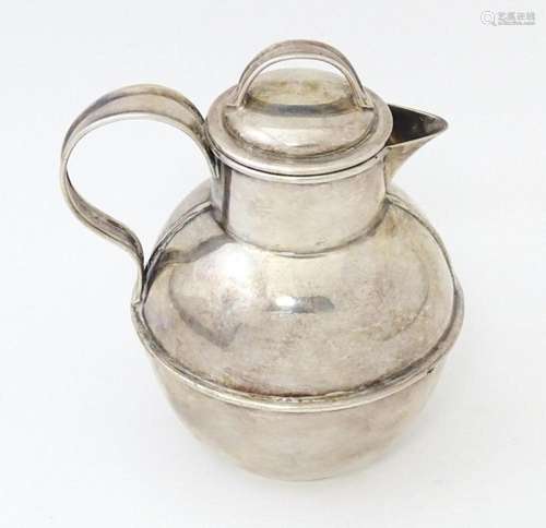 A silver plate cream / milk jug modelled as a channel island...