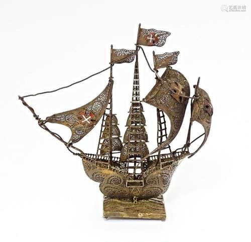 A Portuguese .835 silver gilt filigree model of a sailing bo...