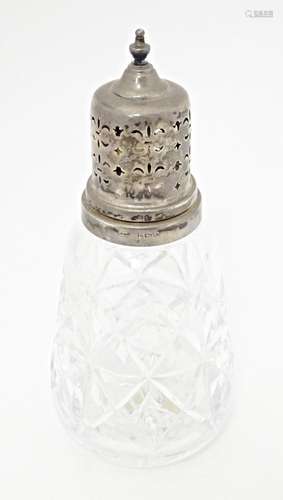 A Tudor Crystal cut glass sugar caster with silver top, hall...