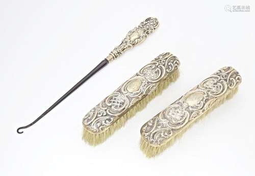 Two Victorian silver backed brushes hallmarked Birmingham 18...