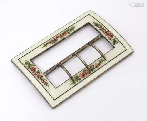 A silver buckle with white guilloche enamel decoration and f...