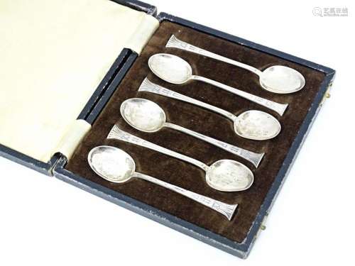 A set of six silver teaspoons with stylised capitals to hand...