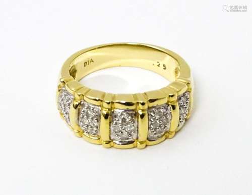 A 14ct gold ring set with diamonds. Ring size approx. M 1/2